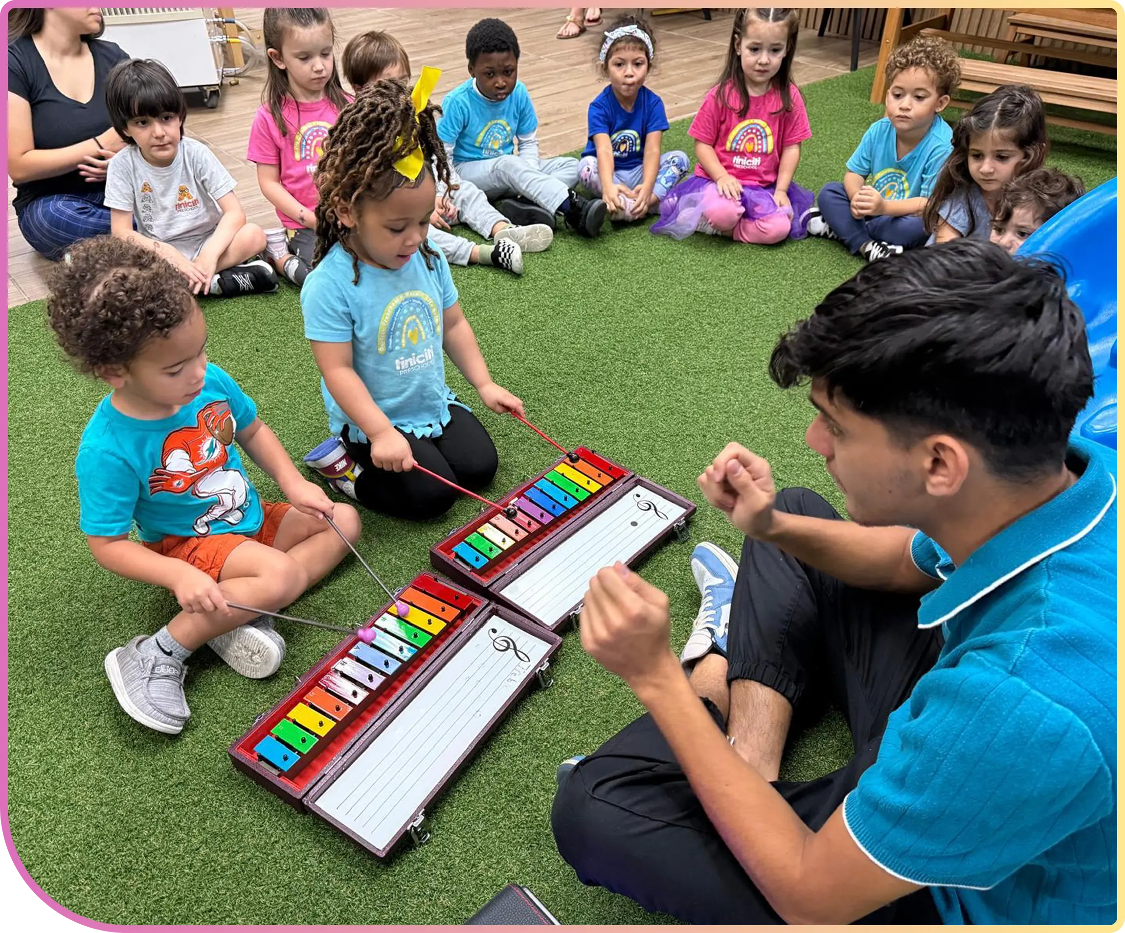Children learning with a teacher in class