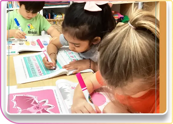 Children working with teacher